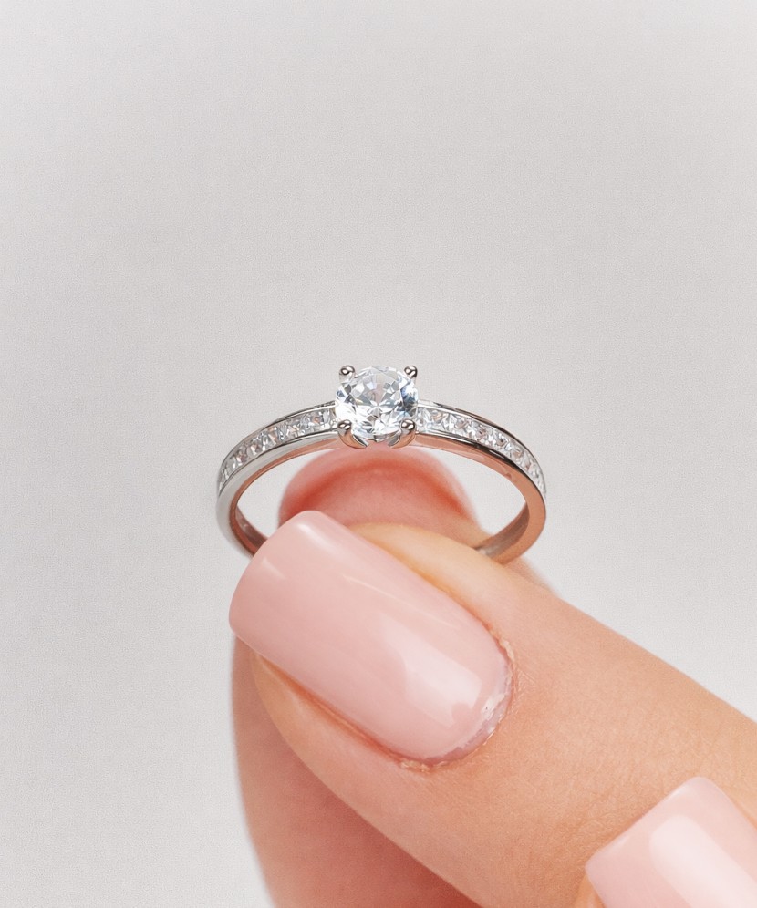 White gold ring with zircons