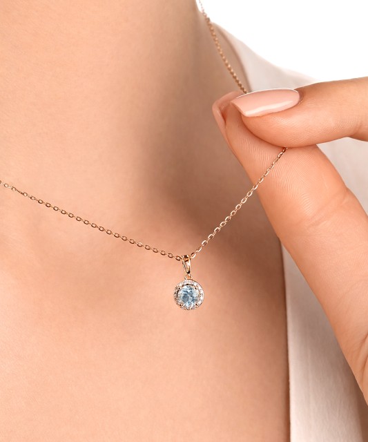 Gold pendant with topaz and diamonds