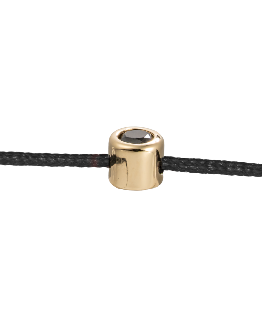 Black string bracelet with black diamond and yellow gold