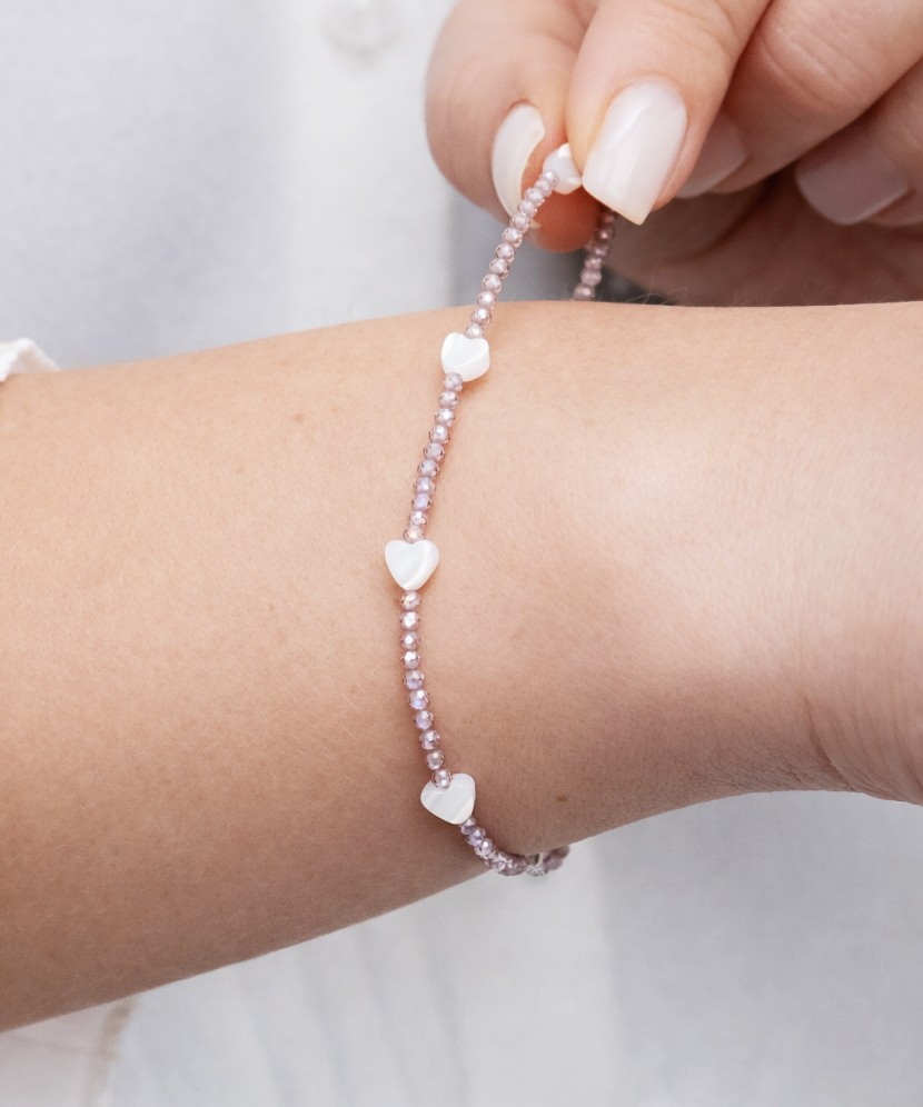 Rannekoru zirkoneilla ja helmiäisellä