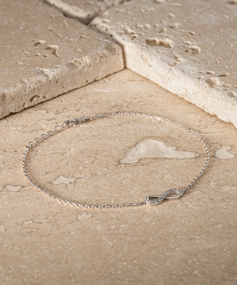 Valkokultainen rannekoru zirkoneilla "Infinity"