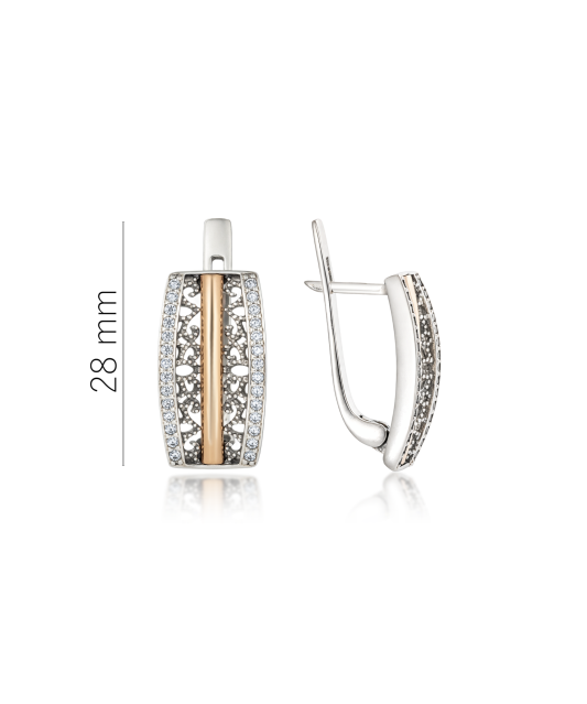 Hopeiset korvakorut peittää kullalla zirkoneilla