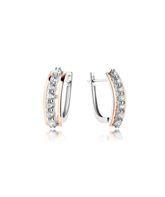 Hopeiset korvakorut peittää kullalla zirkoneilla