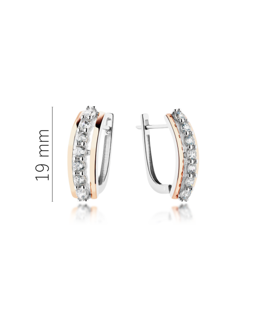 Hopeiset korvakorut peittää kullalla zirkoneilla