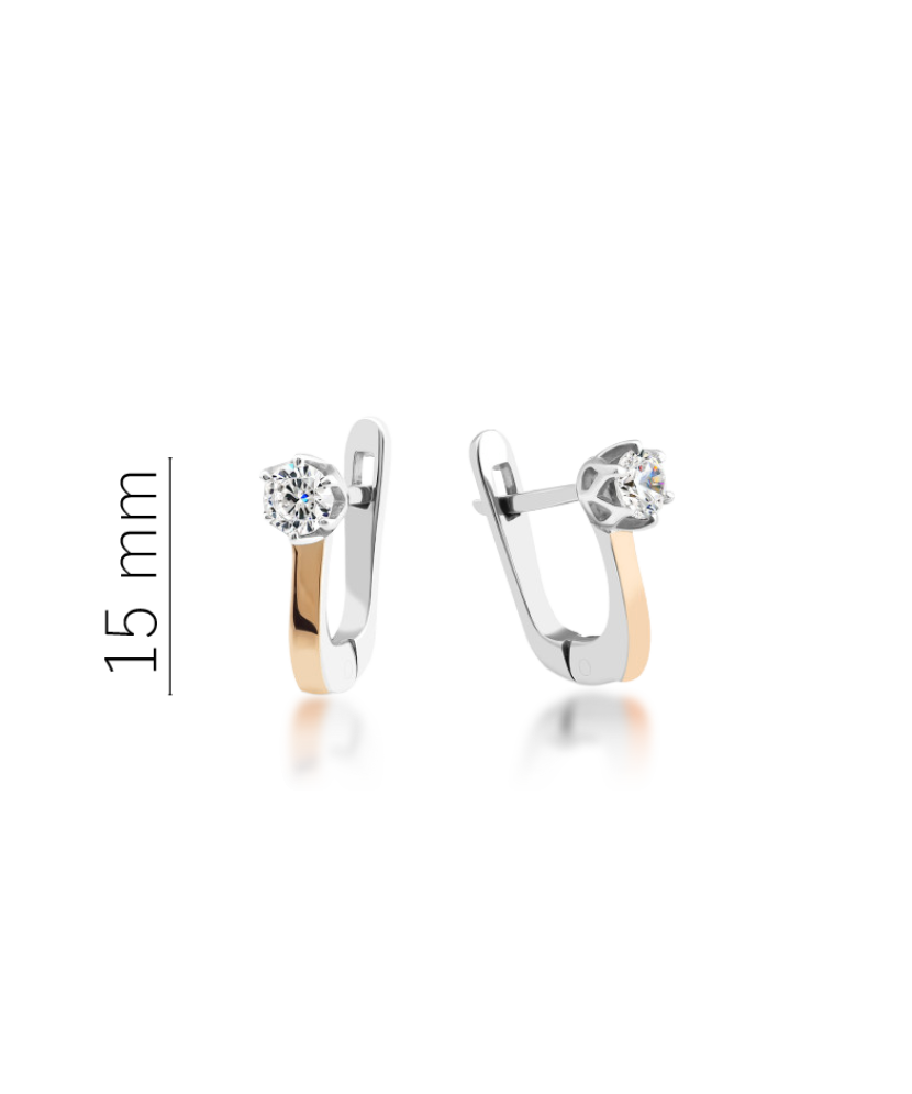 Hopeiset korvakorut peittää kullalla zirkoneilla