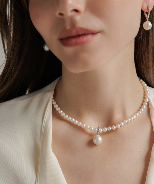 Silver pendant with Edison pearl and zircon