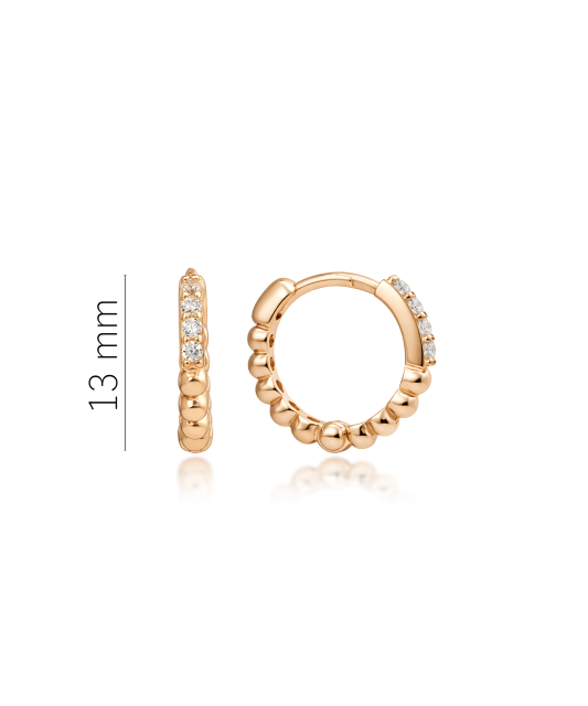 Kultaiset korvakorut zirkoneilla