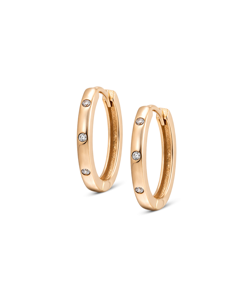 Kultaiset korvakorut zirkoneilla