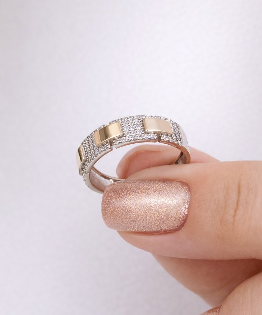 Hopeasormus kullalla peitetty zirkoneilla