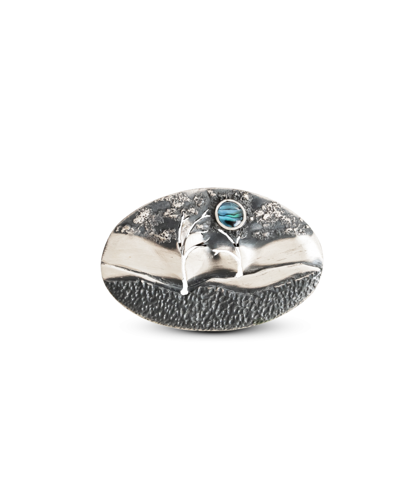 Silver brooch with mother-of-pearl