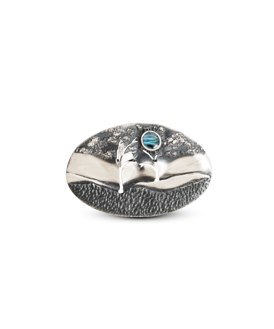 Silver brooch with mother-of-pearl