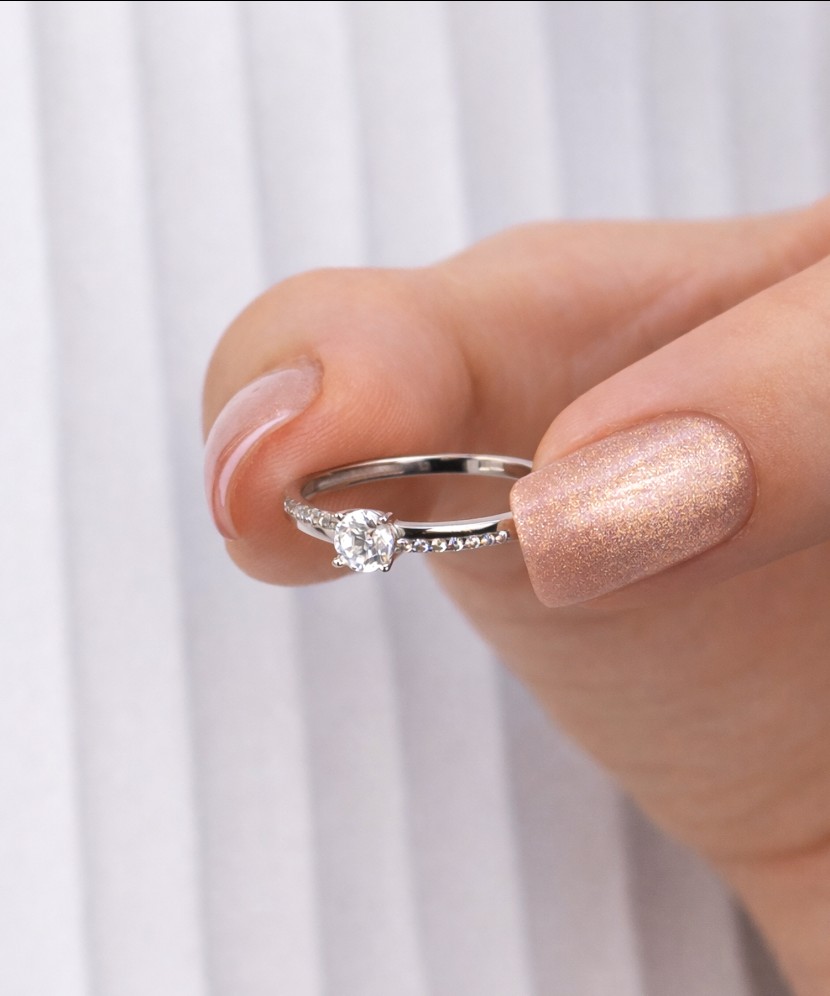 White gold ring with zircons
