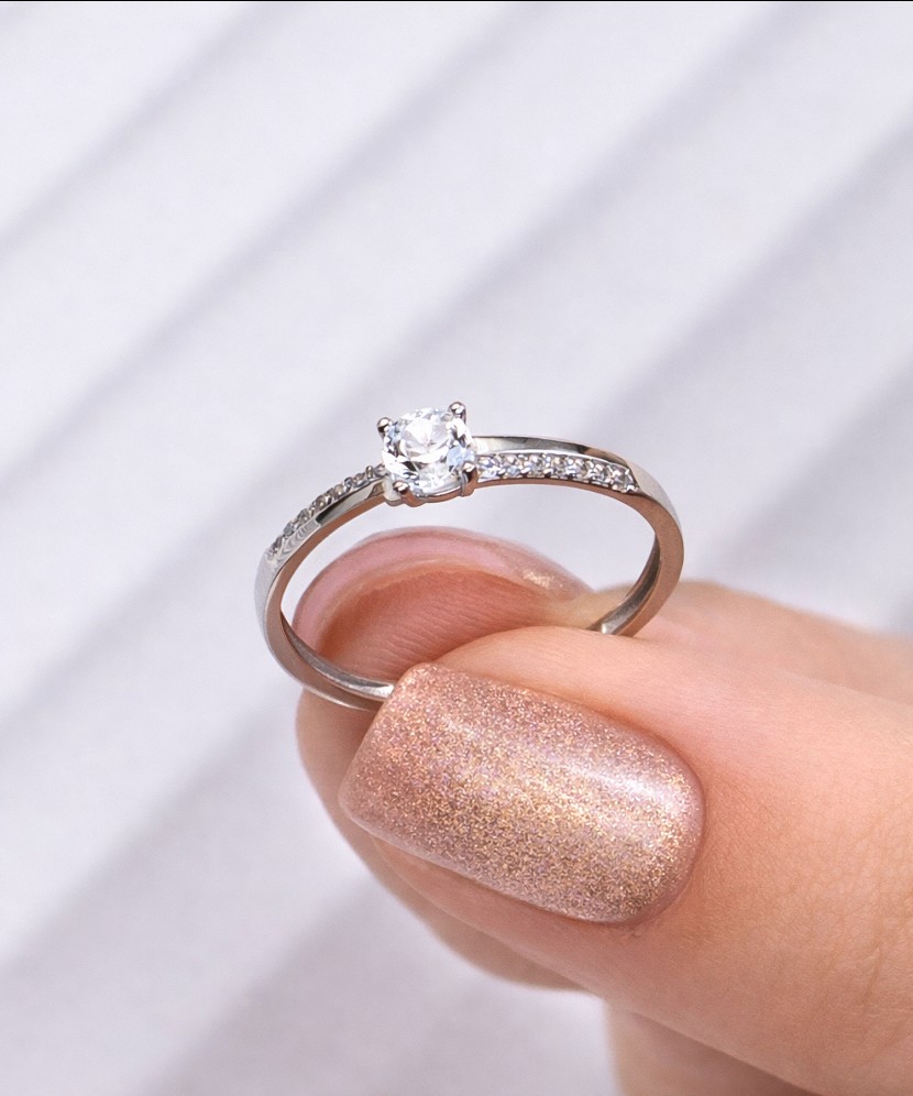 White gold ring with zircons