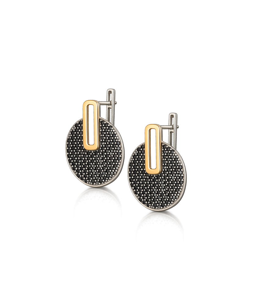 Hopeiset korvakorut peittää kullalla zirkoneilla