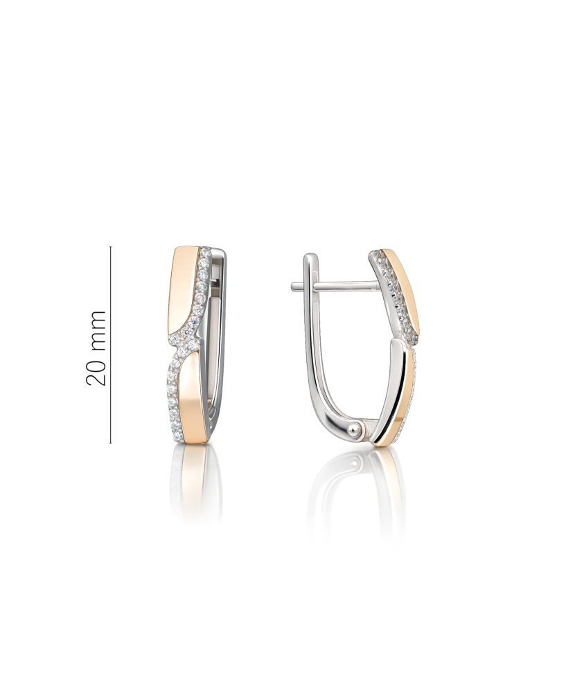 Hopeiset korvakorut peittää kullalla zirkoneilla