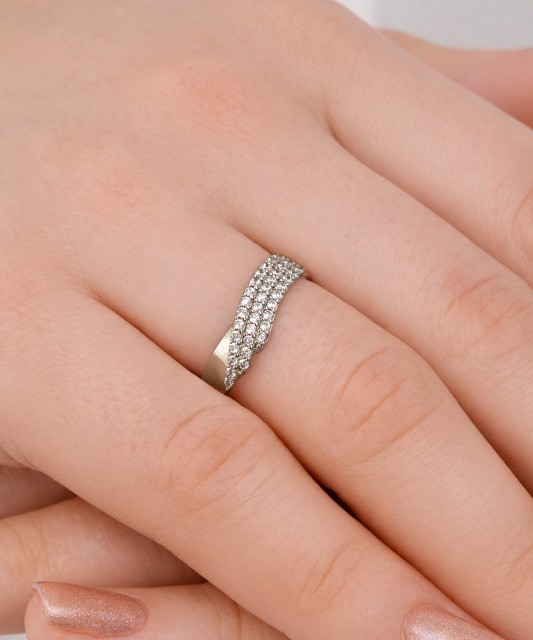 White gold ring with zircons