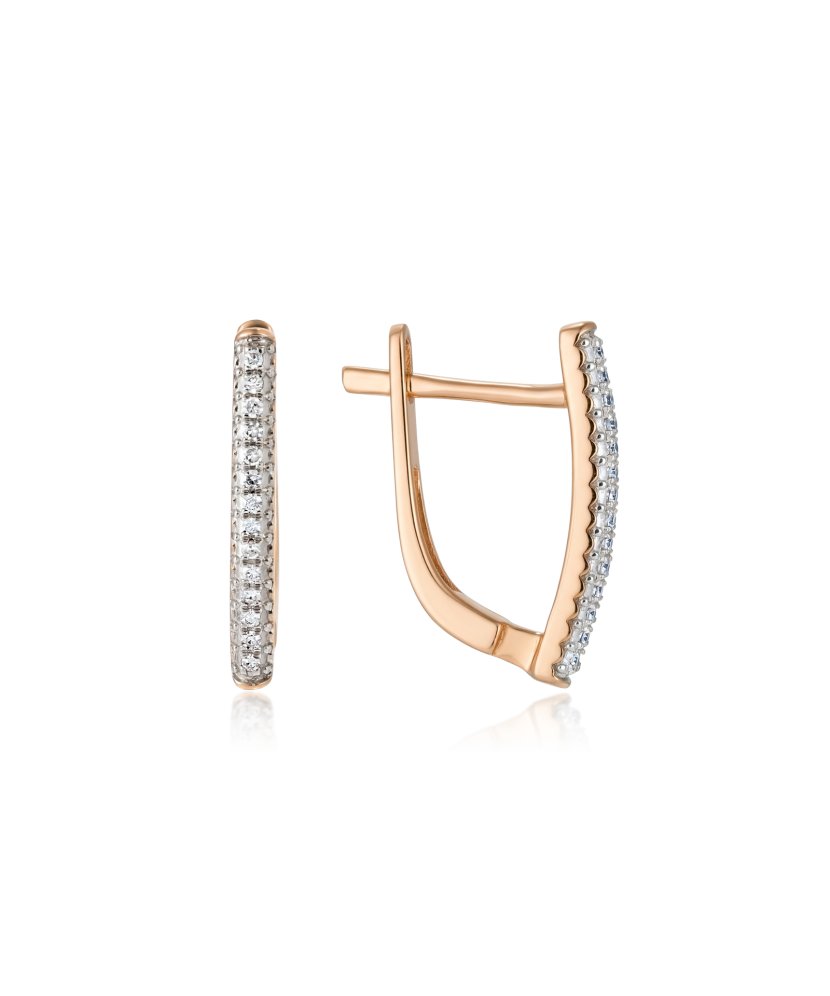 Kultaiset korvakorut timanteilla