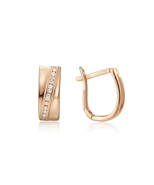 Kultaiset korvakorut zirkoneilla