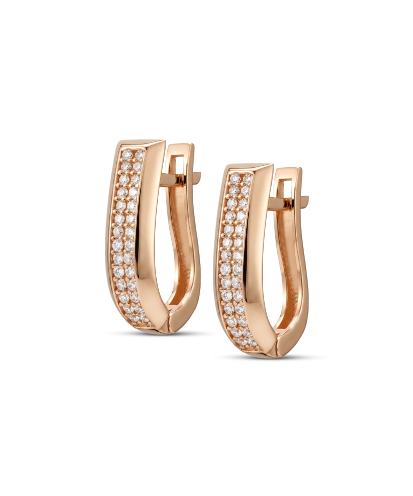 Kultaiset korvakorut zirkoneilla