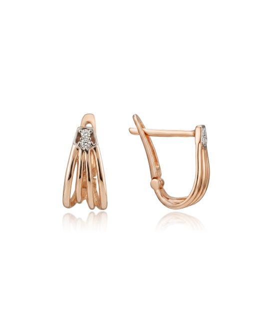 Kultaiset korvakorut zirkoneilla