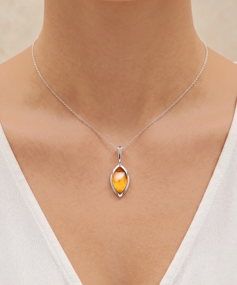 Sterling silver pendant with ambers