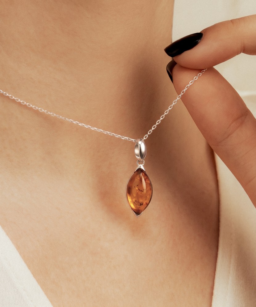 Sterling silver pendant with amber