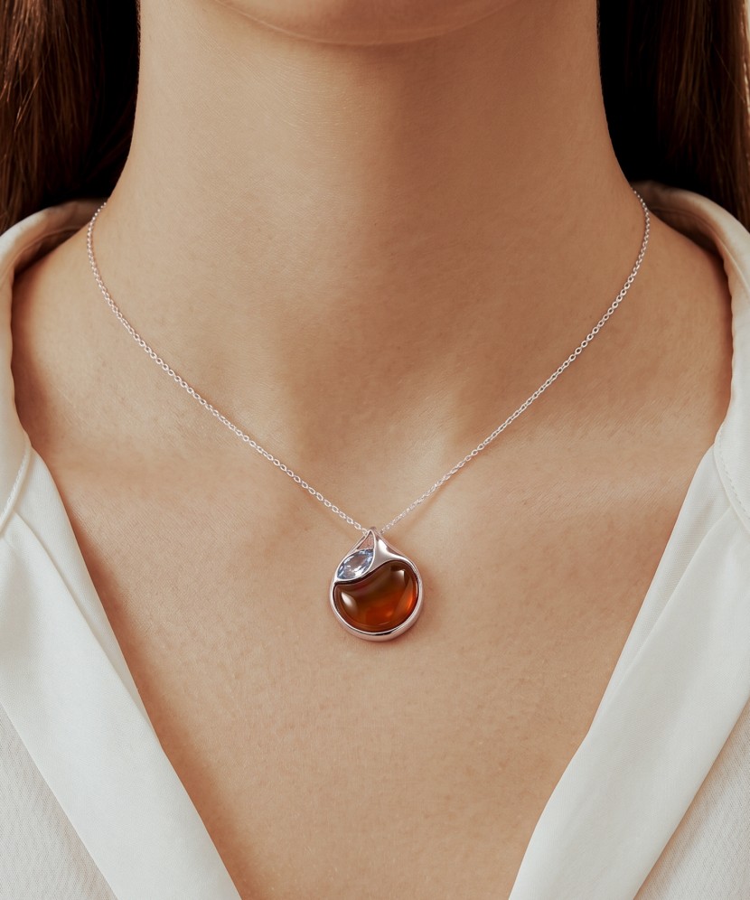 Sterling Silver pendant with amber and topaz