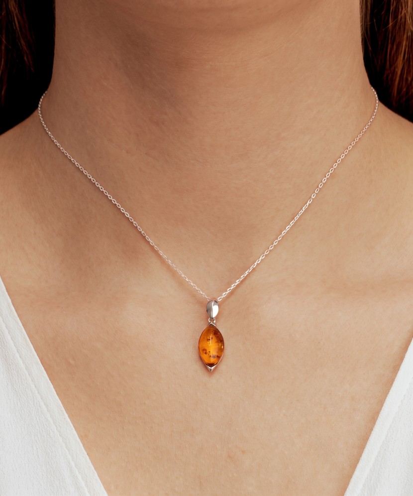 Sterling silver pendant with amber