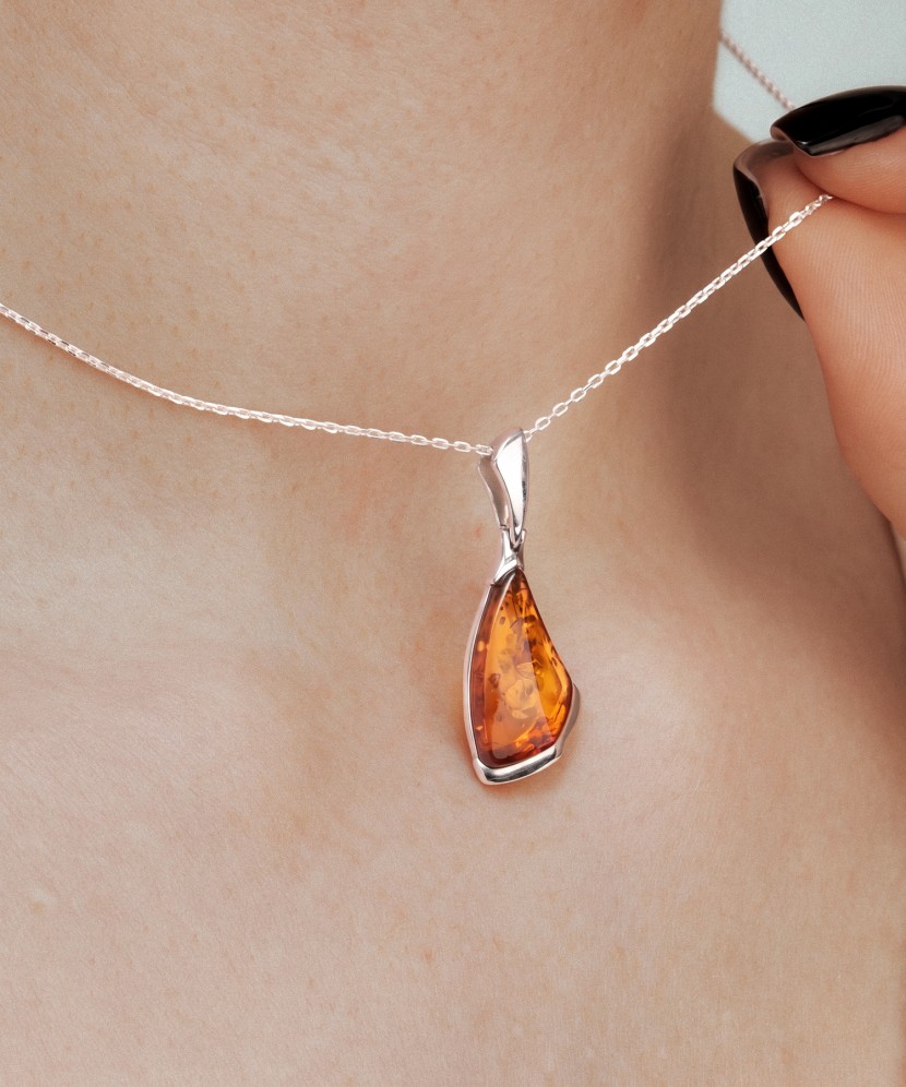 Sterling silver pendant with amber