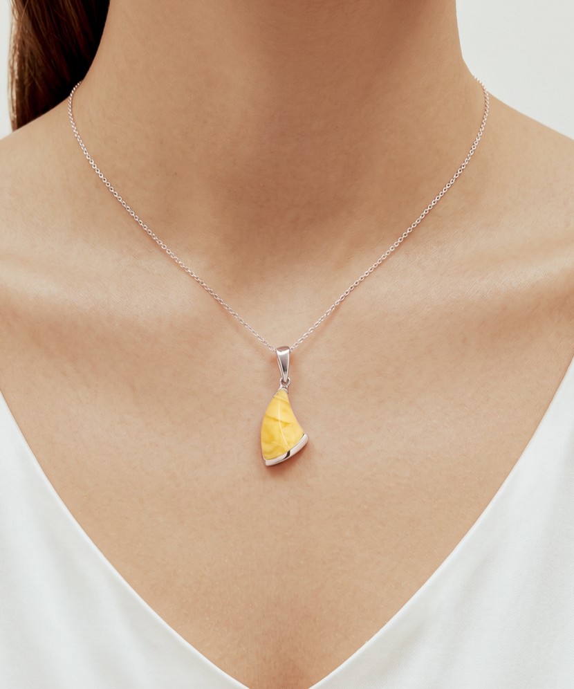 Sterling silver pendant with amber