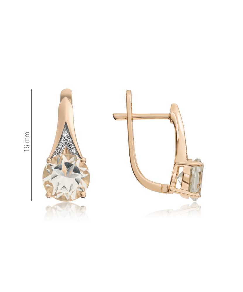 Gold earrings with diamonds and topazes