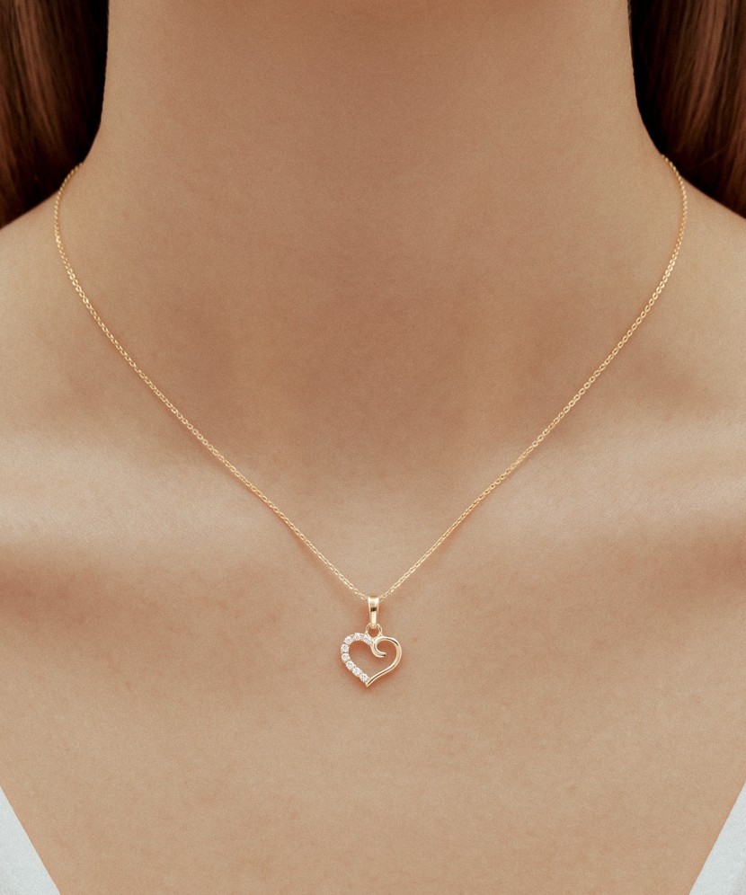 Gold pendant with zircons "heart"