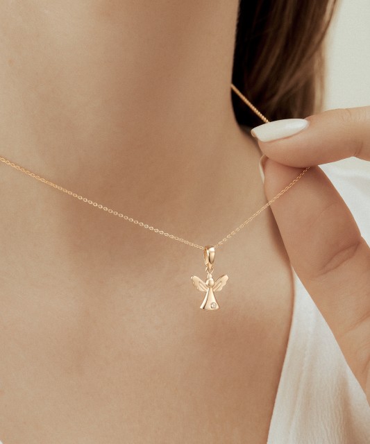 Gold pendant with zirconium "angel"