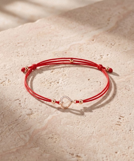 Red string bracelet with gold zirconia pendant “Heart”