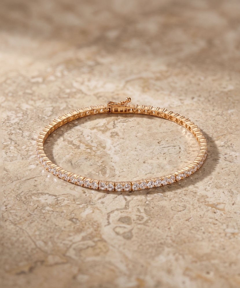 Gold bracelet with zircons