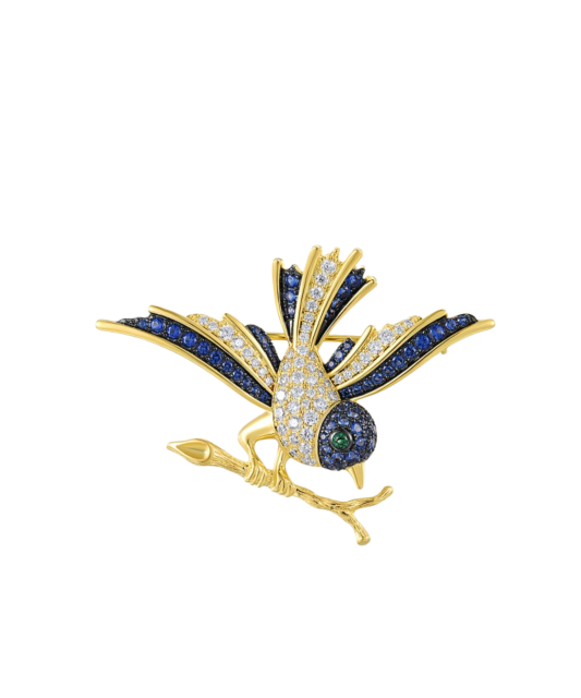 Gilded stetling silver brooch with spinels and zircons
