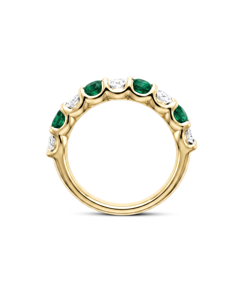 Yellow gold ring with diamonds and emeralds