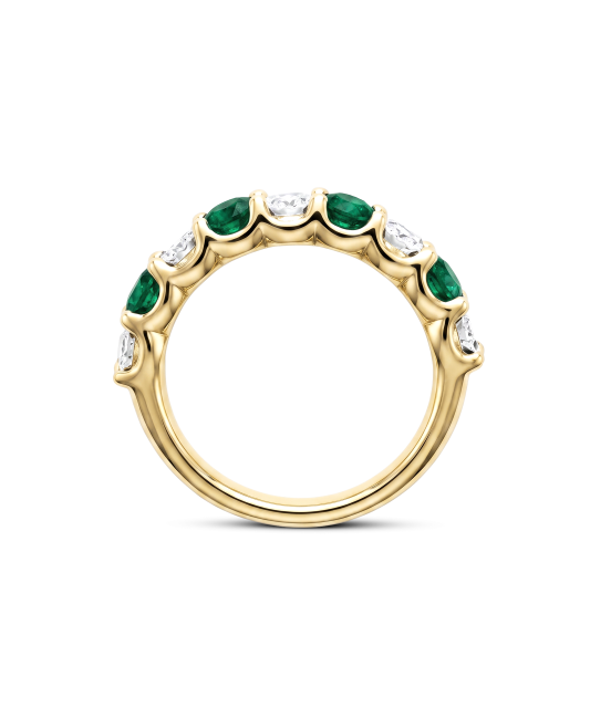Yellow gold ring with diamonds and emeralds