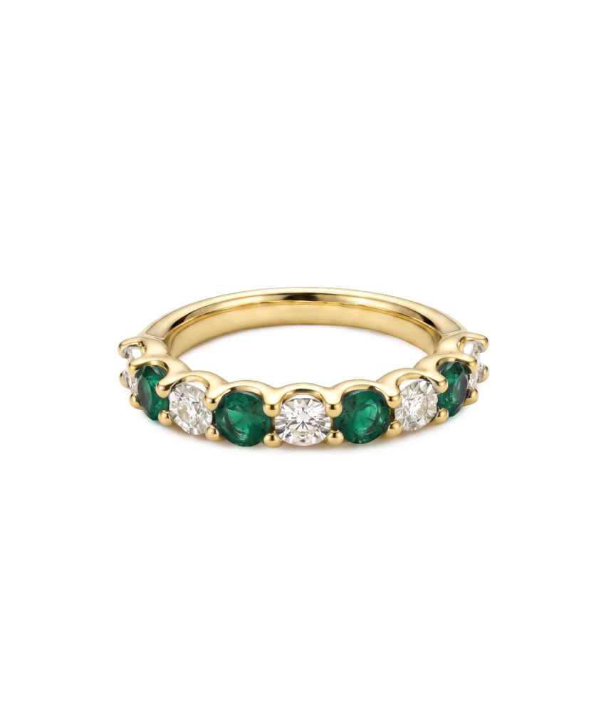 Yellow gold ring with diamonds and emeralds