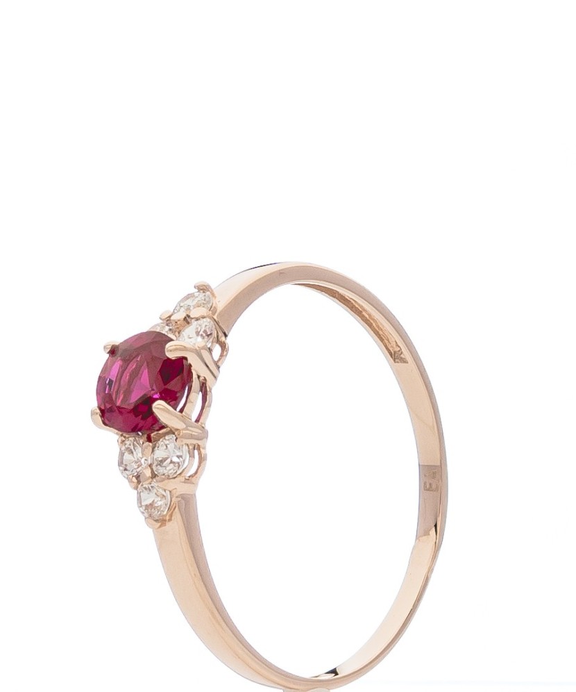 Gold ring with zircons