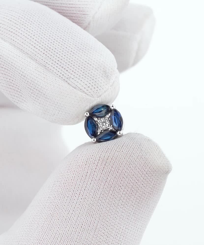 White gold pendant with diamonds and sapphires