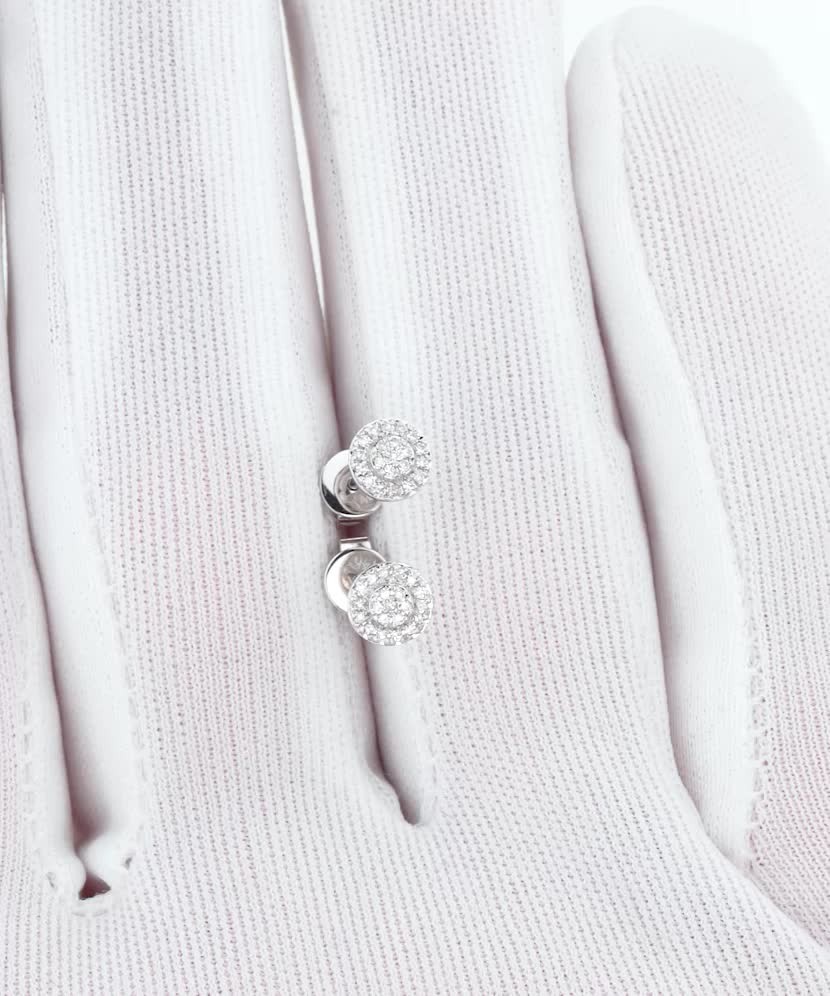 Valkokultaiset korvakorut timanteilla