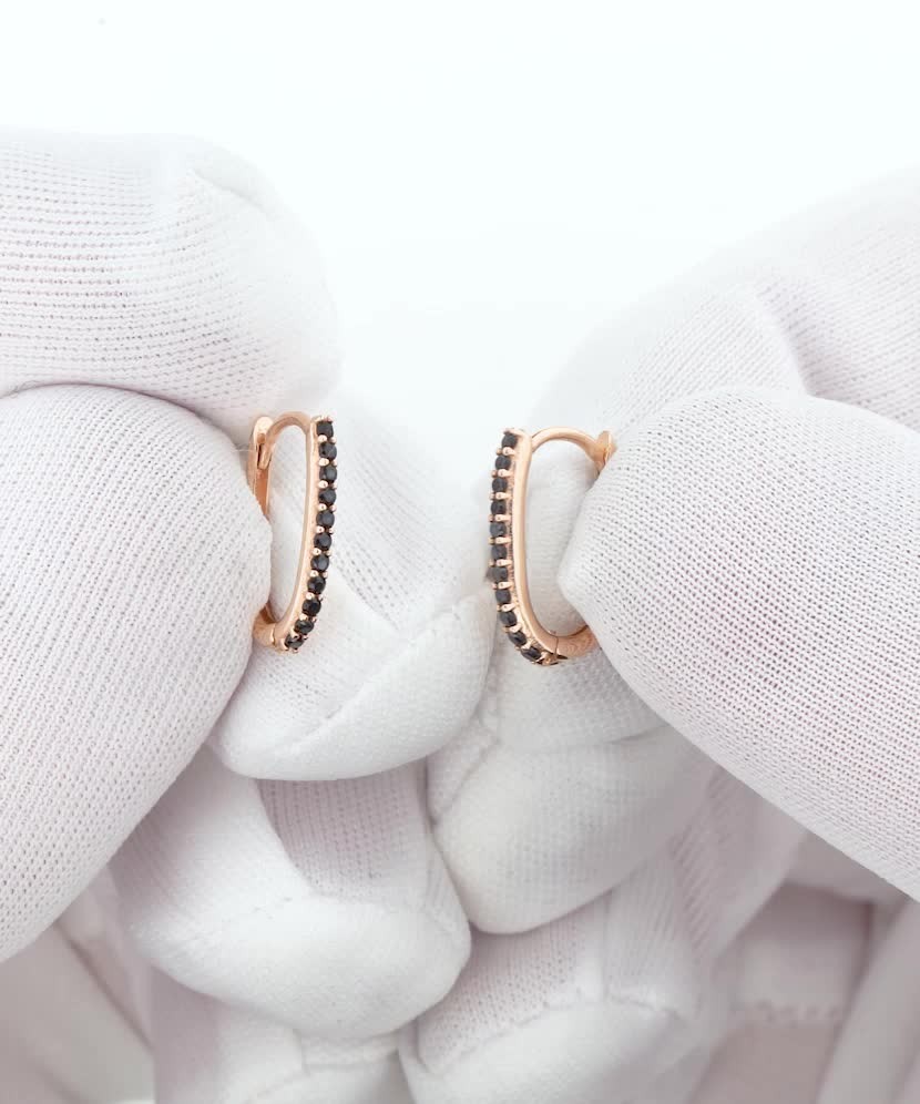 Gold earrings with zircons