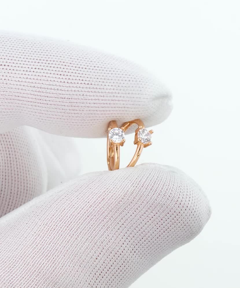 Gold earrings with zircons