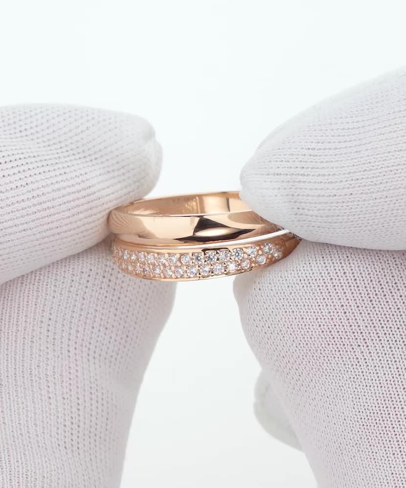 Gold ring with zircons