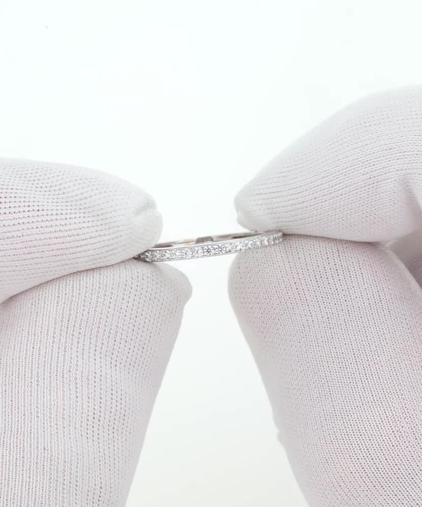 White gold ring with zircons