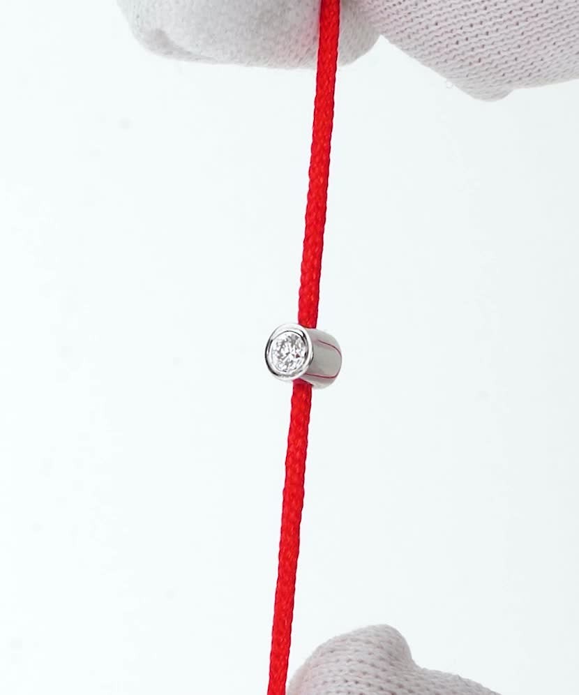 Red string bracelet with white gold and diamond pendant 0.03ct