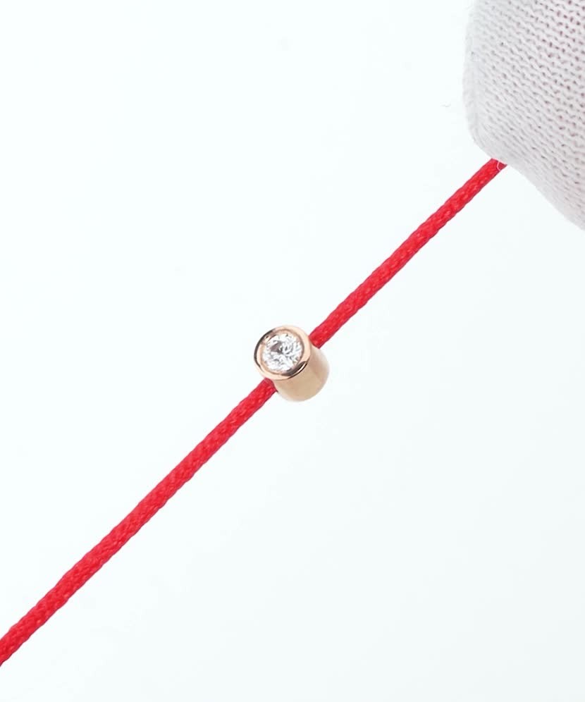 Red string bracelet With gold and diamond pendant 0.05ct