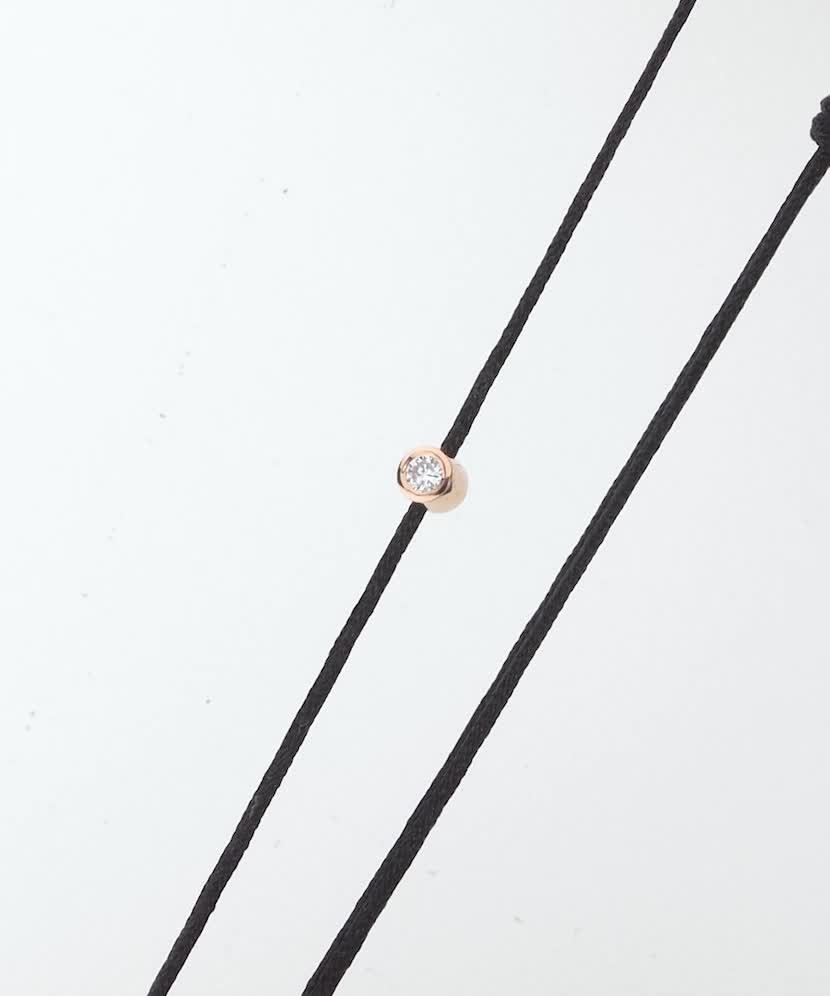 Black string bracelet white gold and diamond pendant 0.03ct