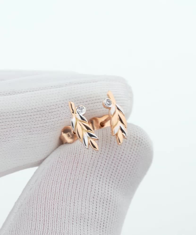 Gold earrings with zircons